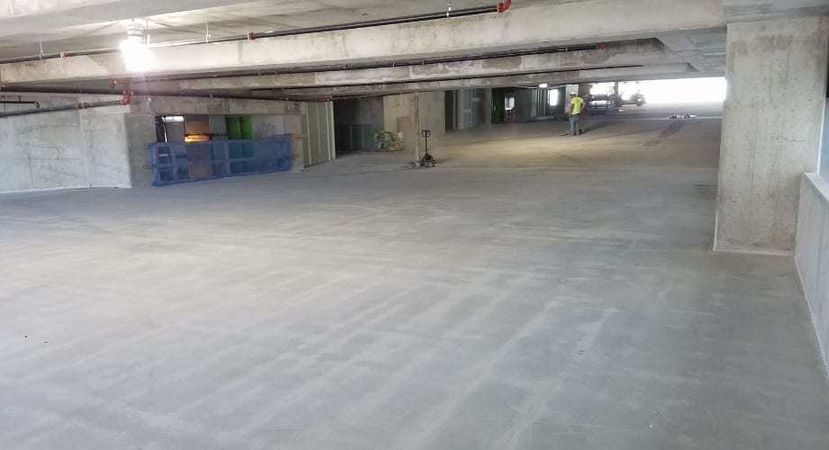 Parking deck prepped with concrete grinder